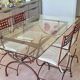 Table fer forgé et verre avec 4 chaises