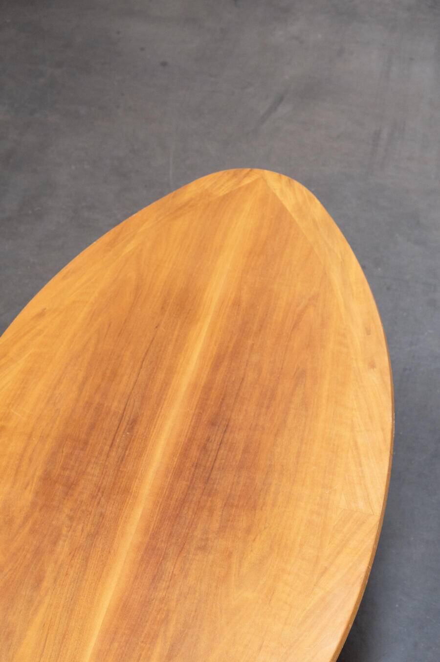 Oval teak coffee table