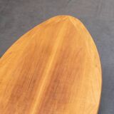 Oval teak coffee table