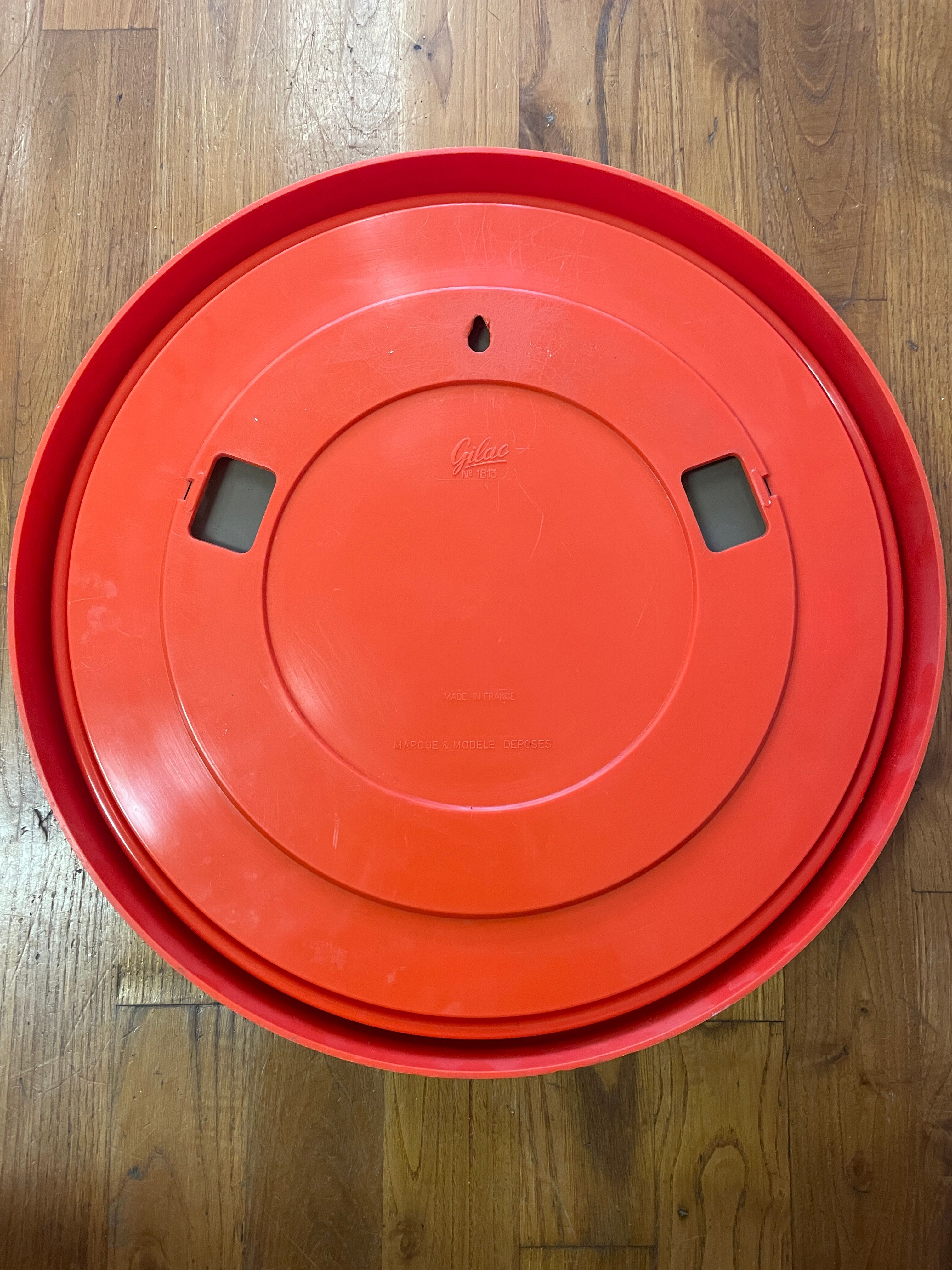 Round orange mirror Gilac for Prisunic
