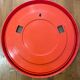 Round orange mirror Gilac for Prisunic