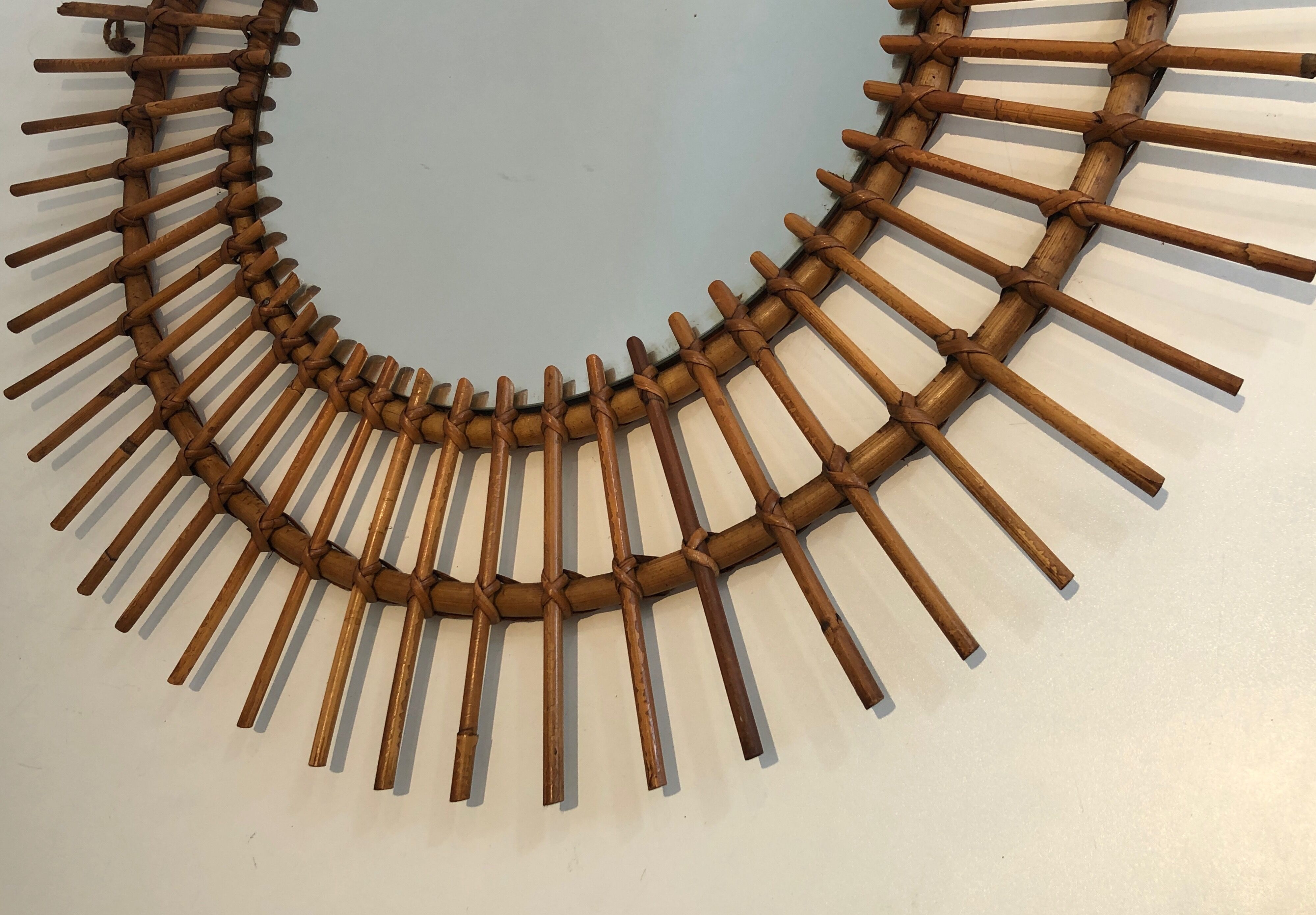 Small Rattan Mirror. French work. Around 1970