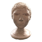 Bust of a young artisanal woman