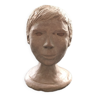 Bust of a young artisanal woman