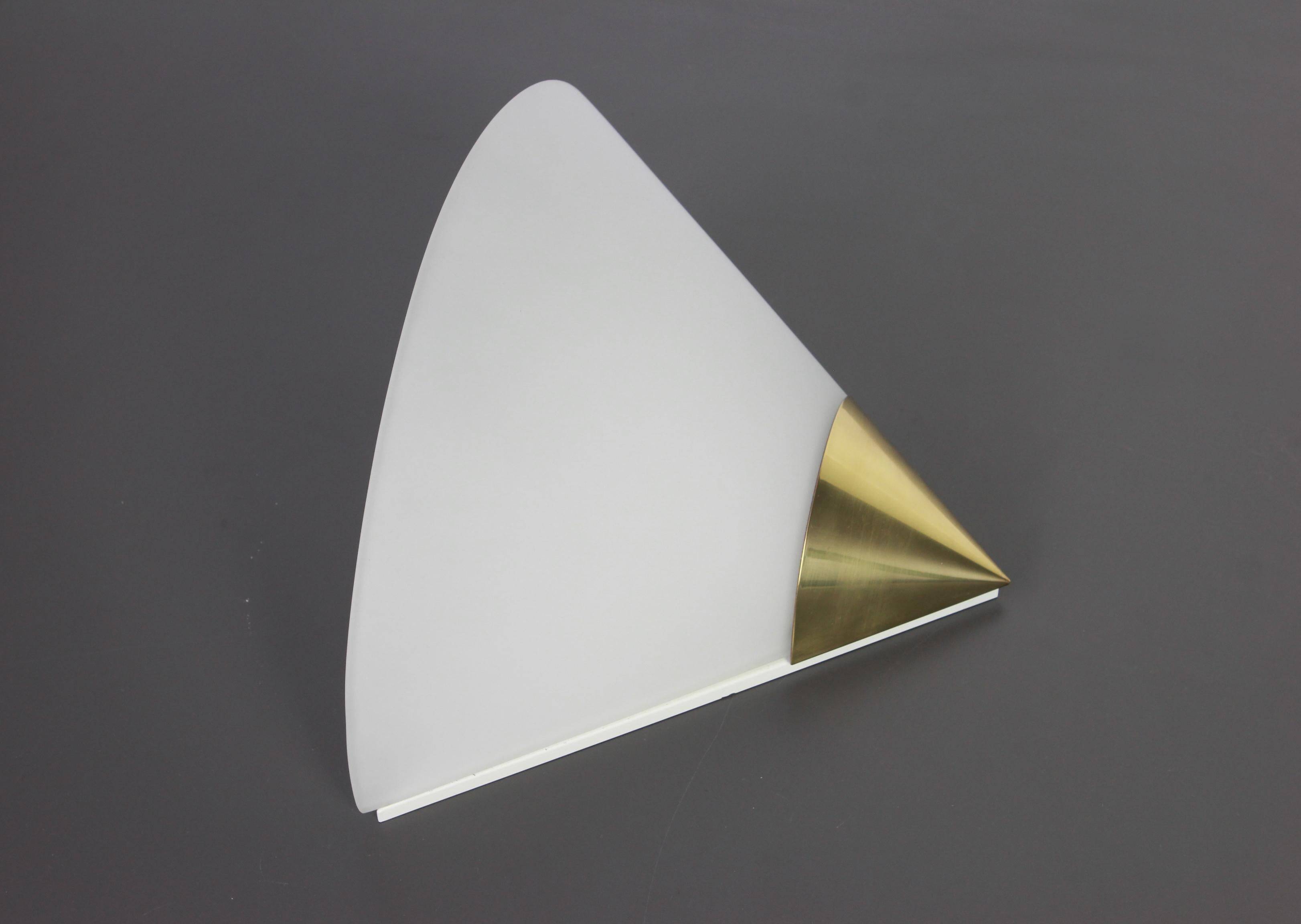 Pair of opaline glass wall lights designed by Limburg, Germany.