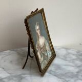 19th-century miniature depicting an 18th-century woman, bronze frame