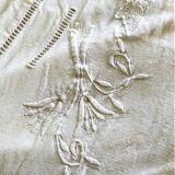 Old drapework and embroidered with 2 flowers and a butterfly