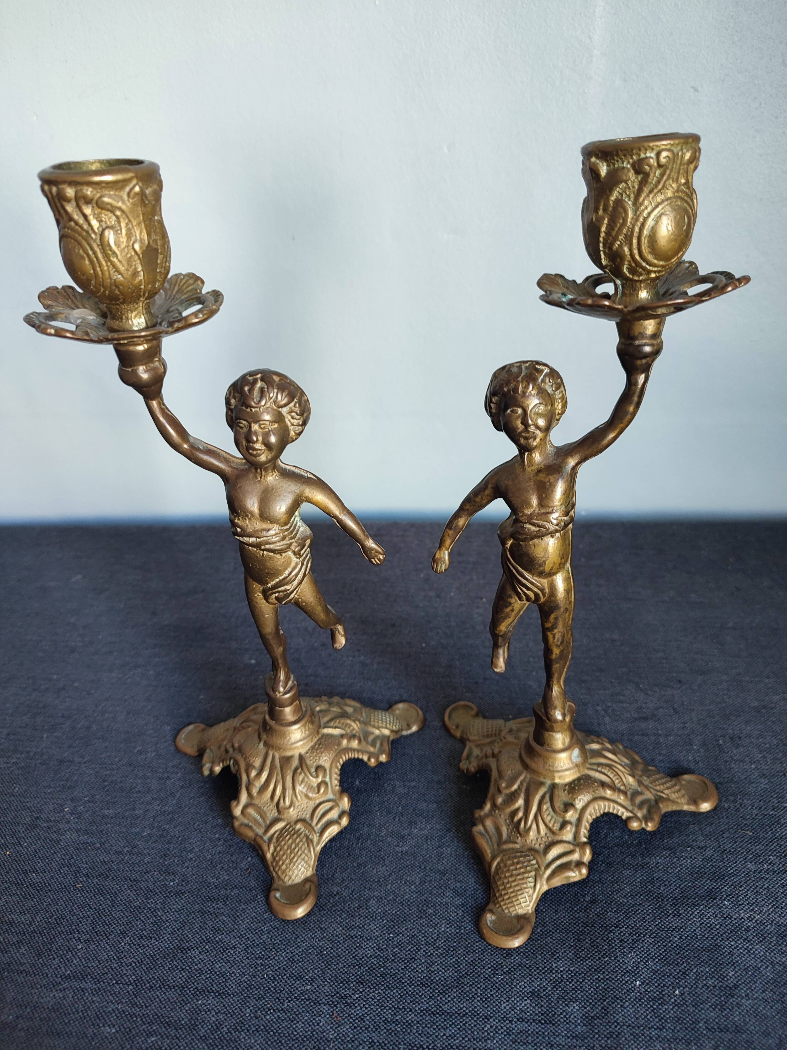 Set of two cherub cherub candlesticks