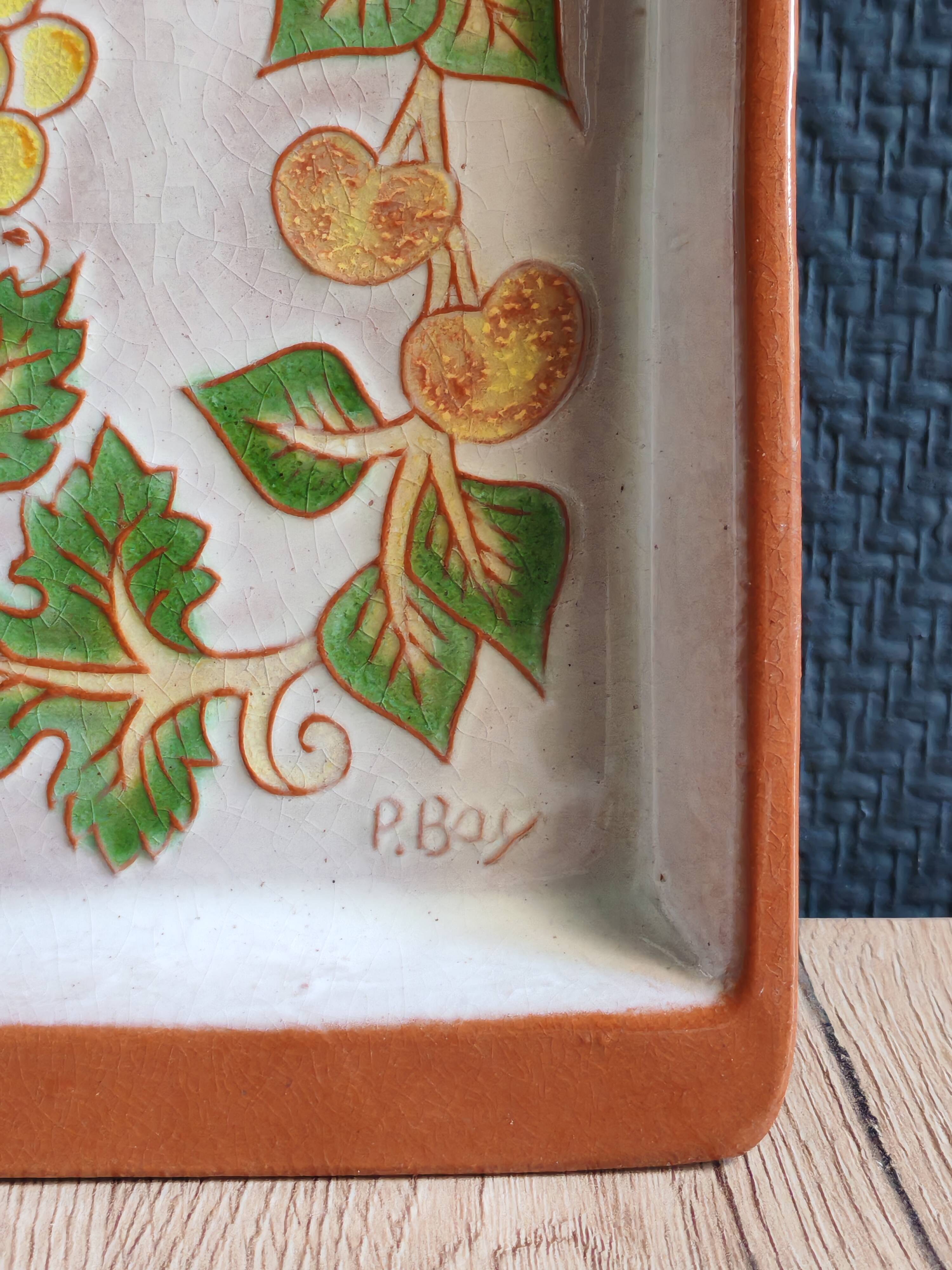 Terracotta plate signed P.Boy, glazed artisanal ceramics.