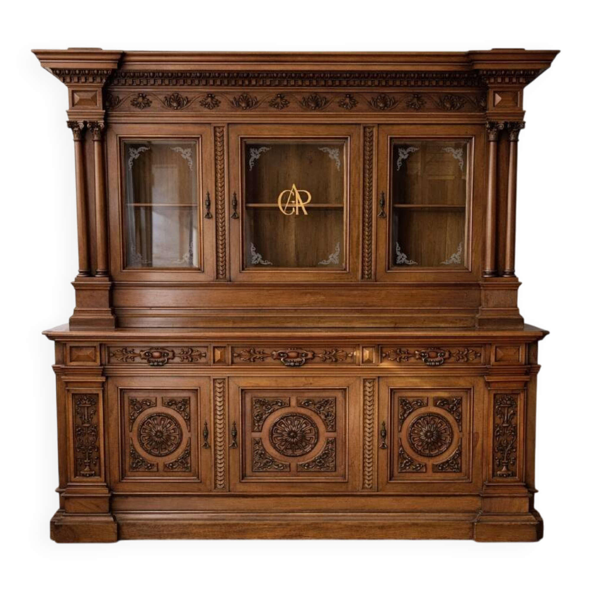 Two-body buffet, made of richly carved solid walnut.
