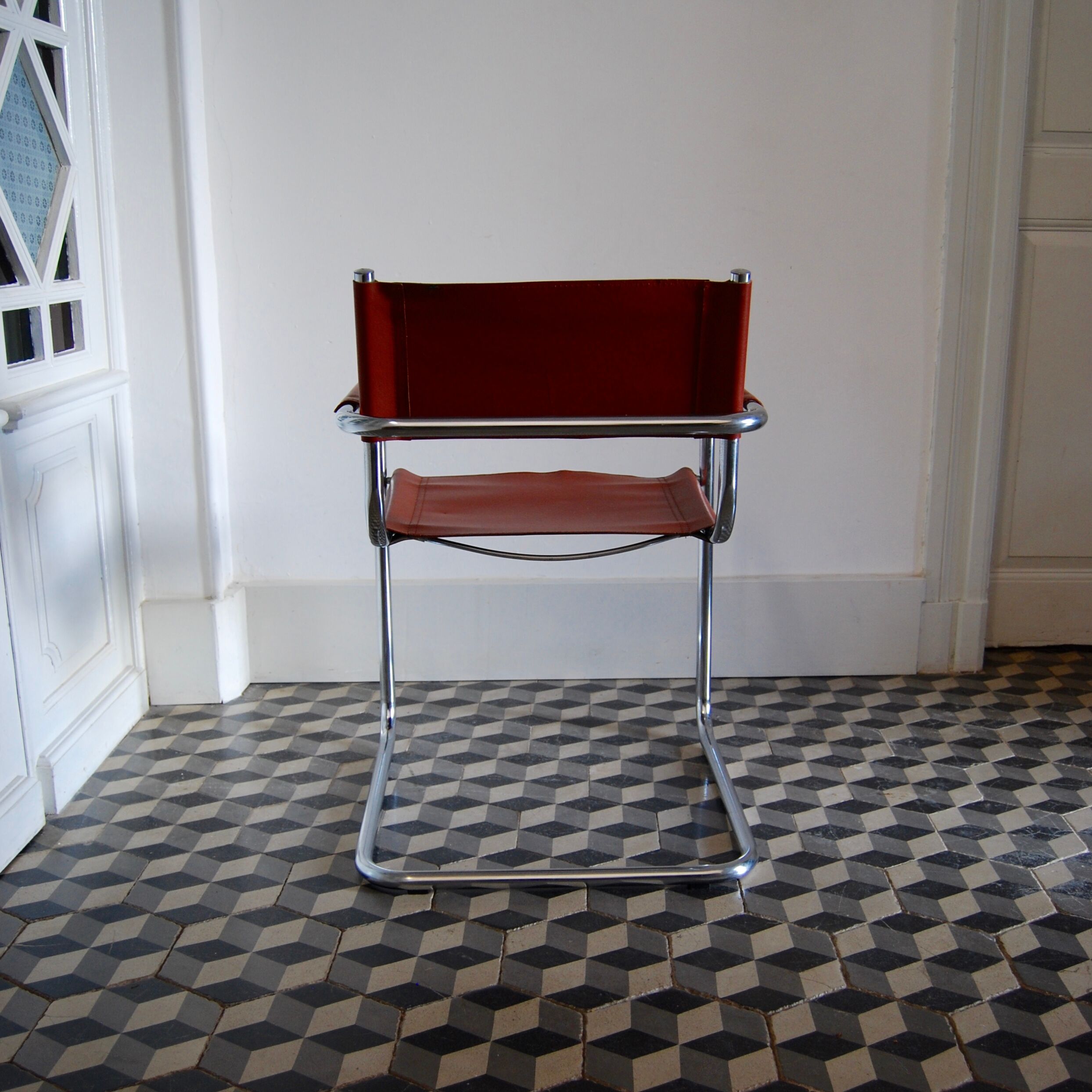 Vintage armchair in chrome and cognac leatherette