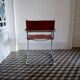 Vintage armchair in chrome and cognac leatherette