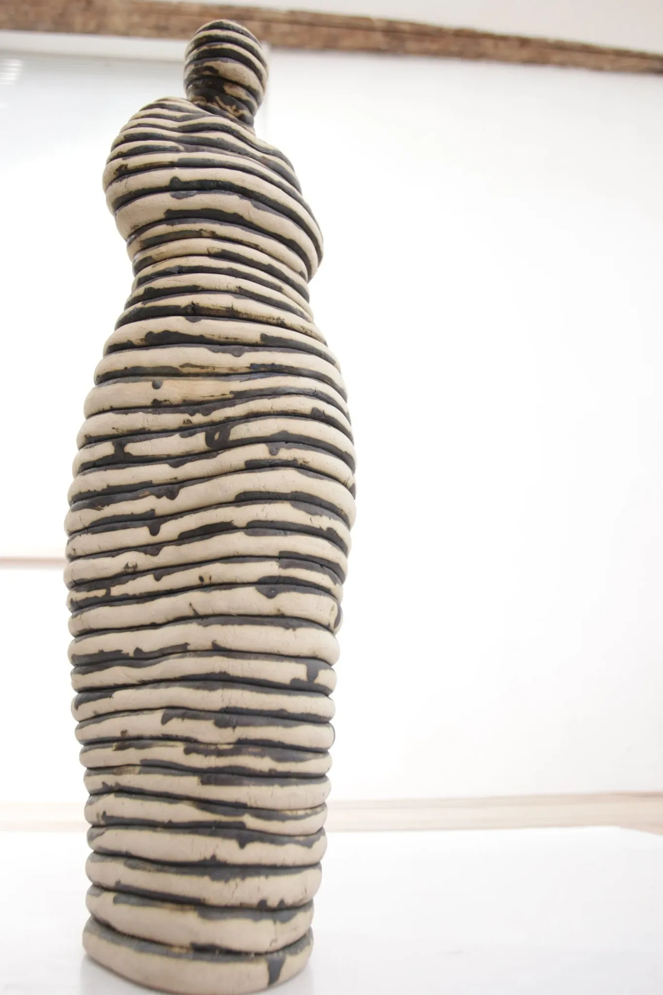 Andrea Dogterom ceramic sculpture women in stripes