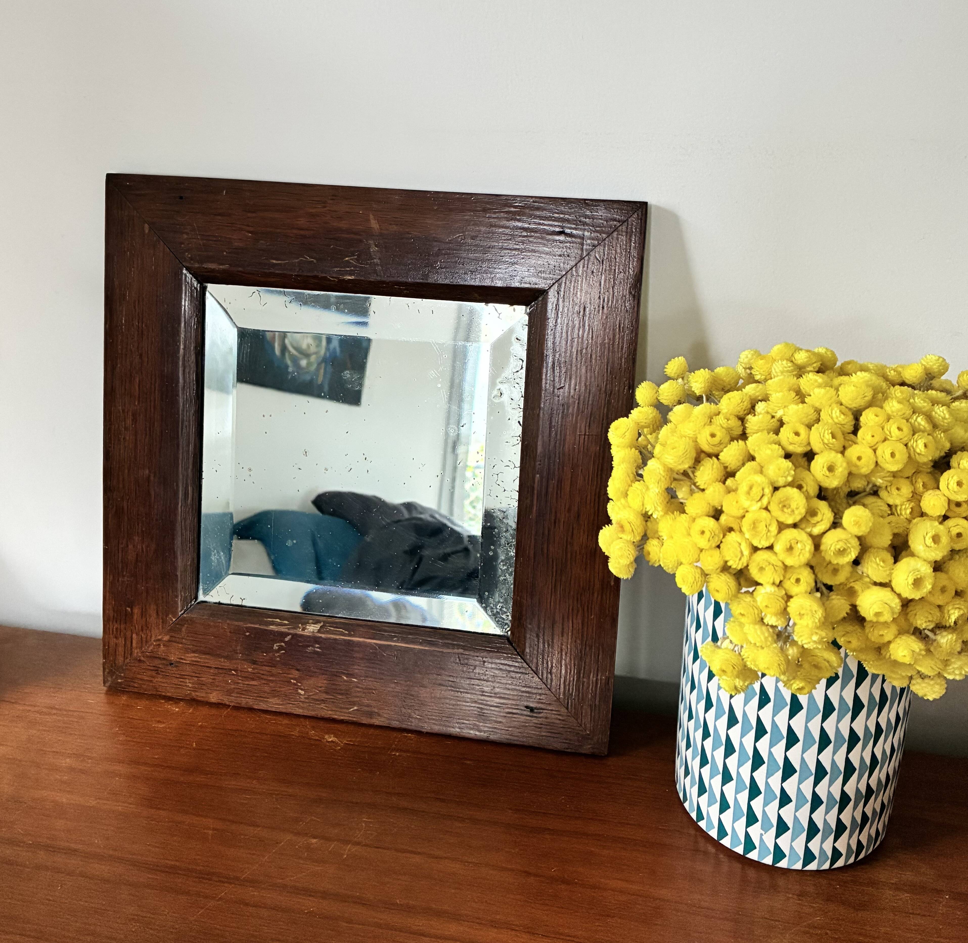 Bevelled mercury mirror with a wooden frame