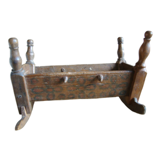 Wooden rocking cradle for dolls
