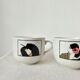 Set of 2 large Art Deco porcelain mugs by Roberto Tortoli.
