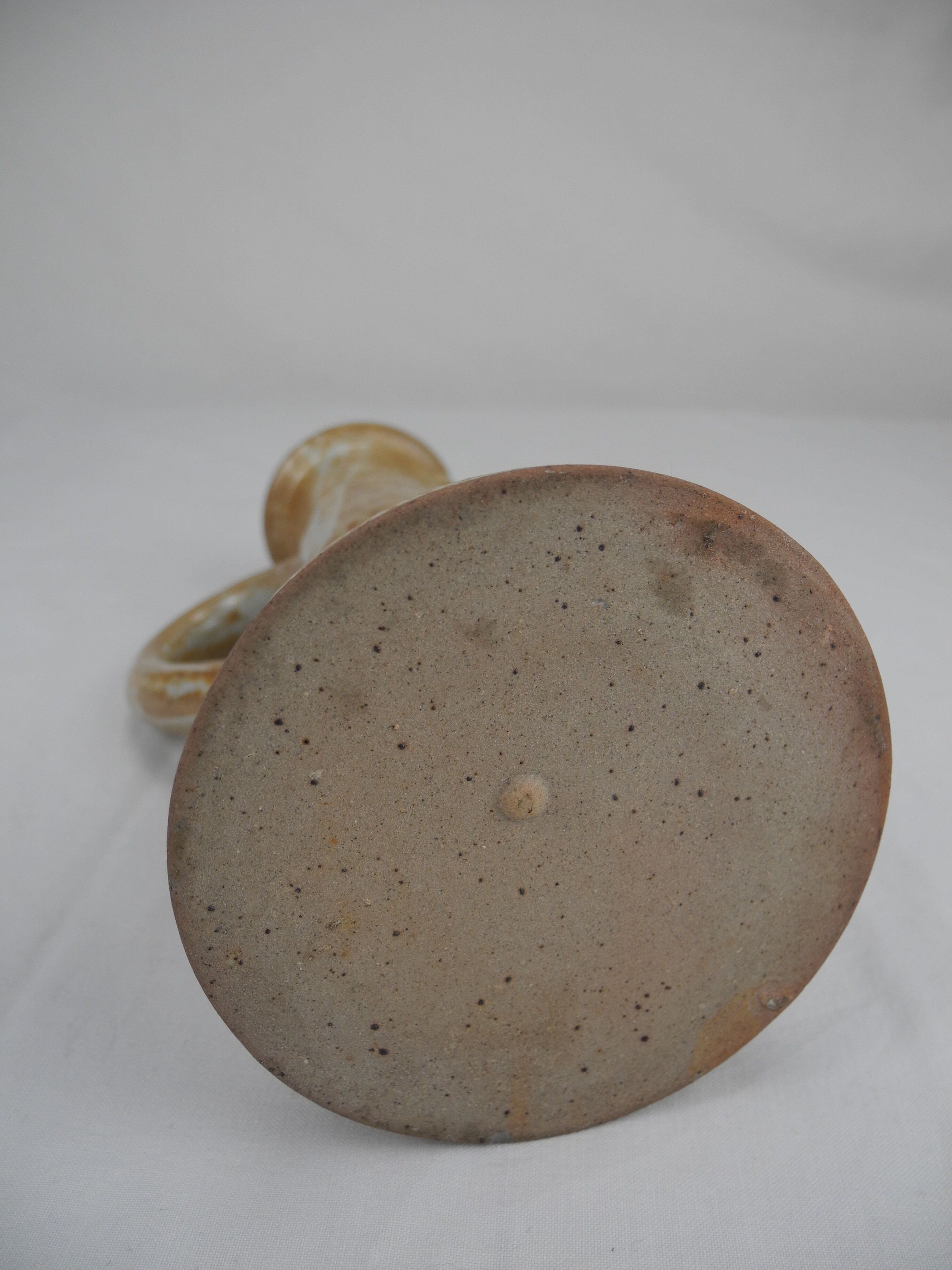 Old vintage stoneware candle holder