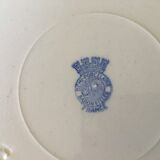 Round hollow earthenware dish