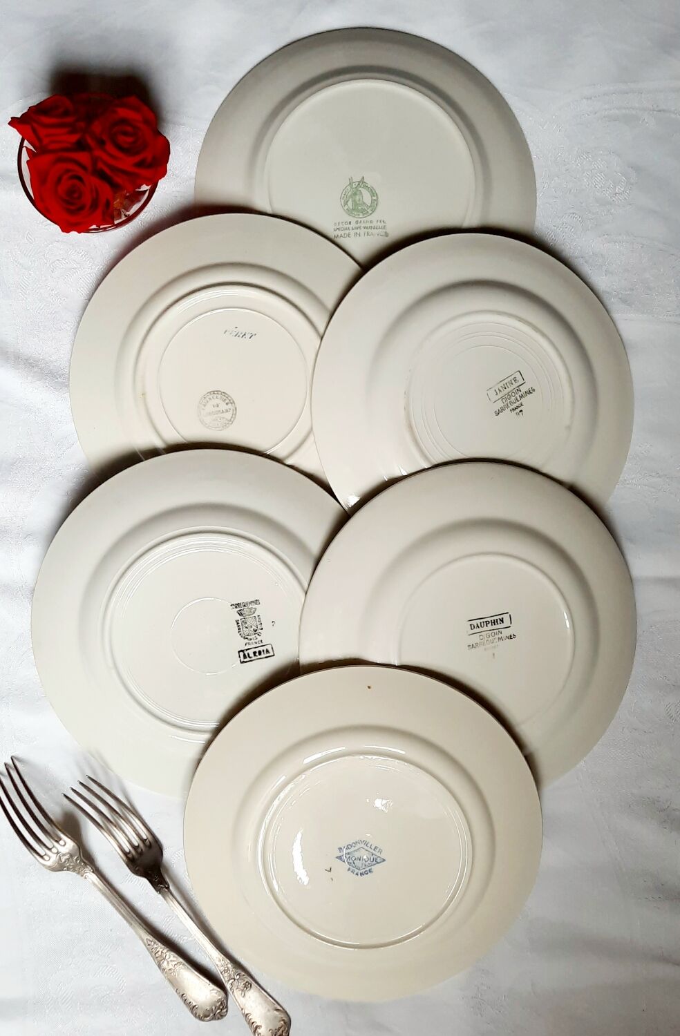 Old flat plates mismatched in earthenware