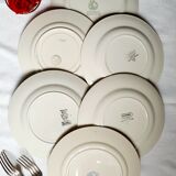 Old flat plates mismatched in earthenware