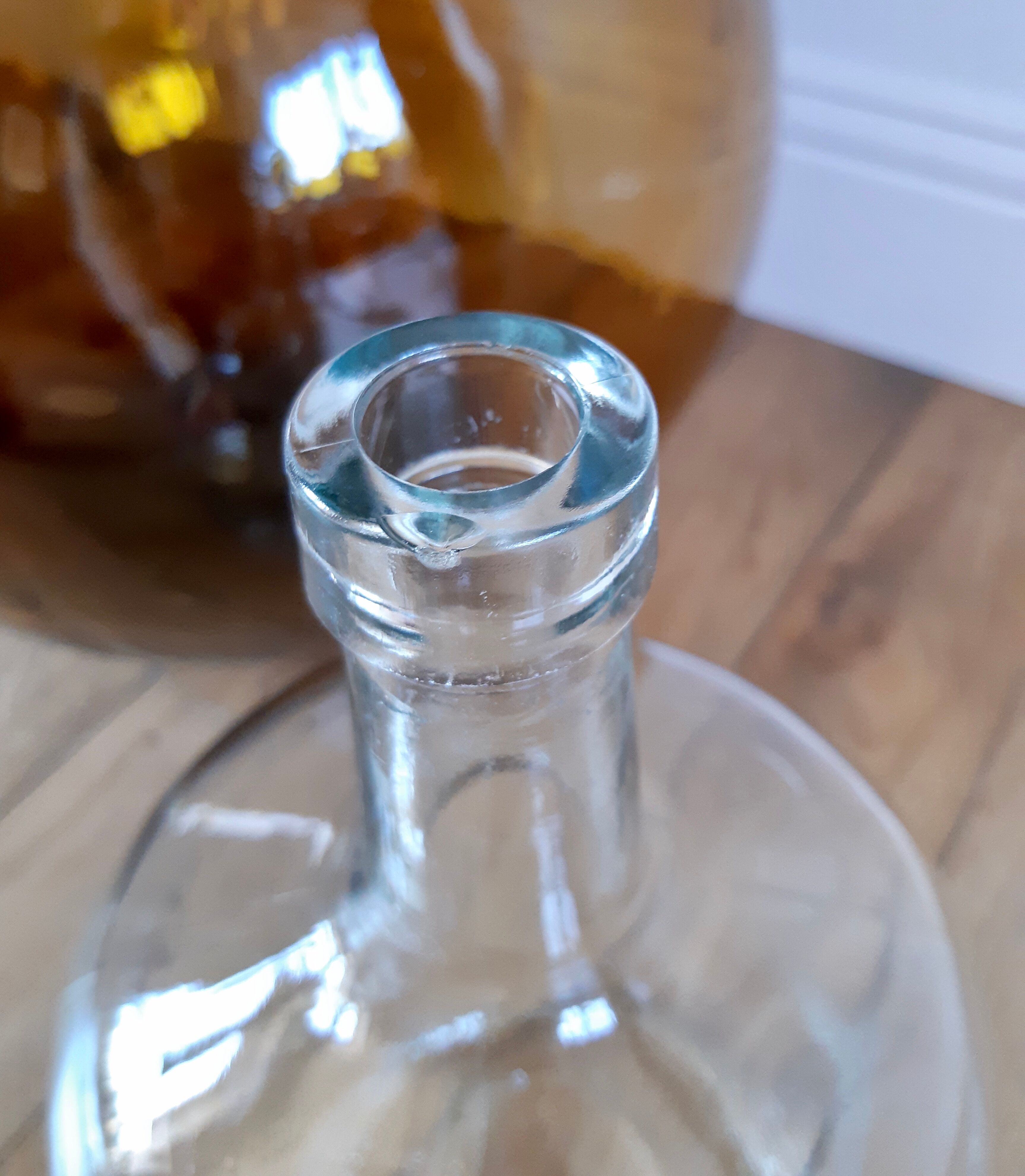 Vintage transparent demijohn