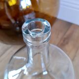 Vintage transparent demijohn