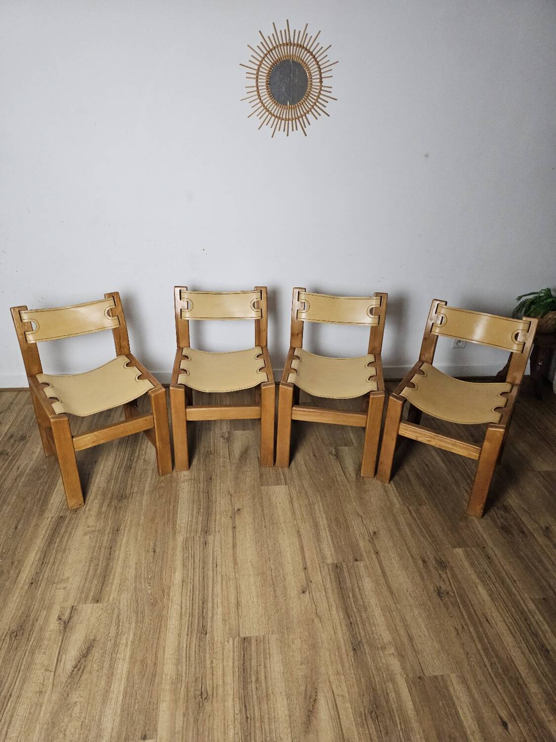 Solid Elm and cream leather chairs, Maison Regain, 1960s.