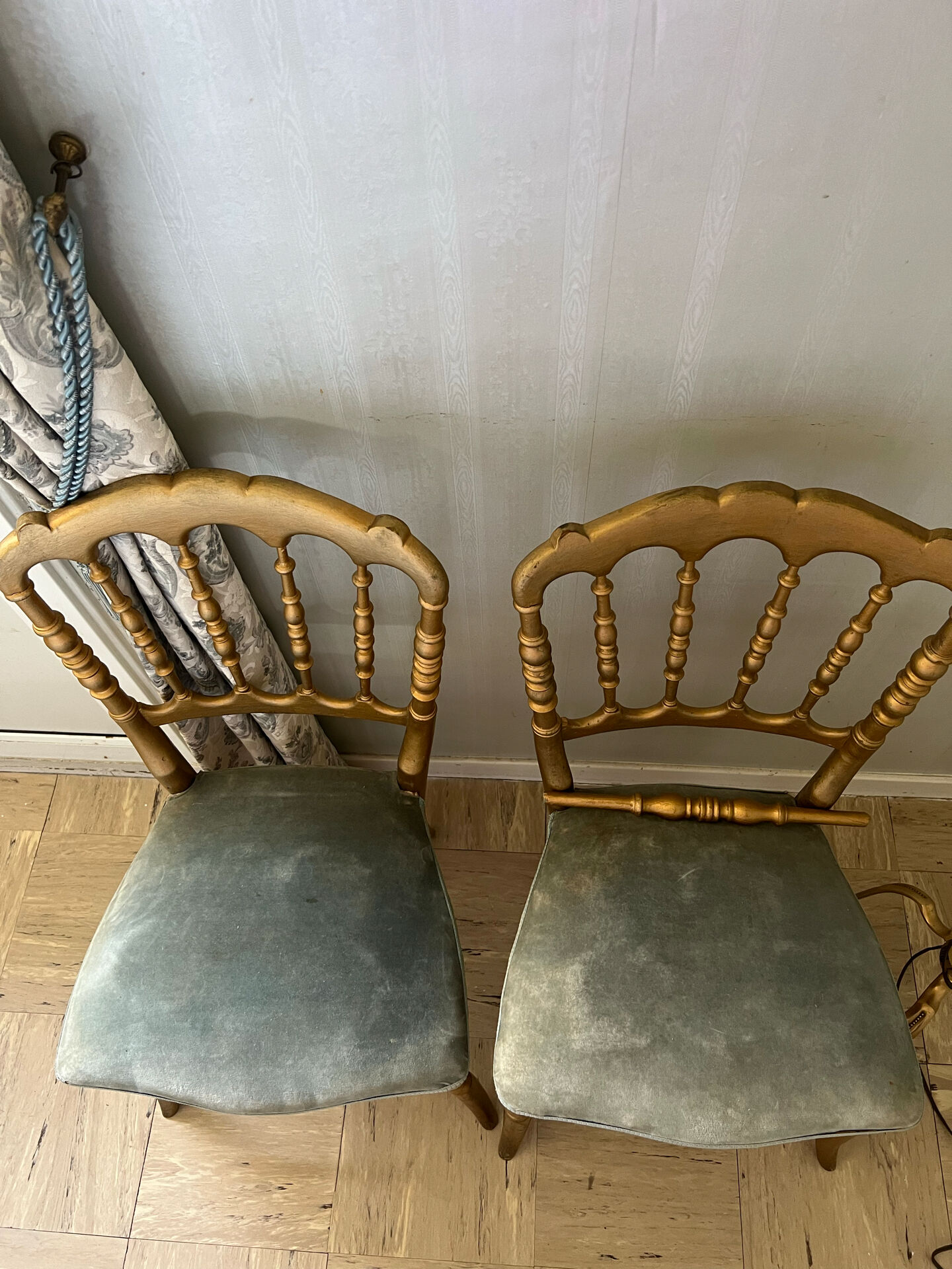 Pair of Napoleon III chairs in gilded wood with velvet upholstery.