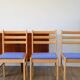 Set of 4 solid pine chairs, reupholstered in ocean blue wool, 1980.
