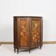 Buffet ou armoire d'angle, à 3 faces, en bois massif, sculpté et peint.