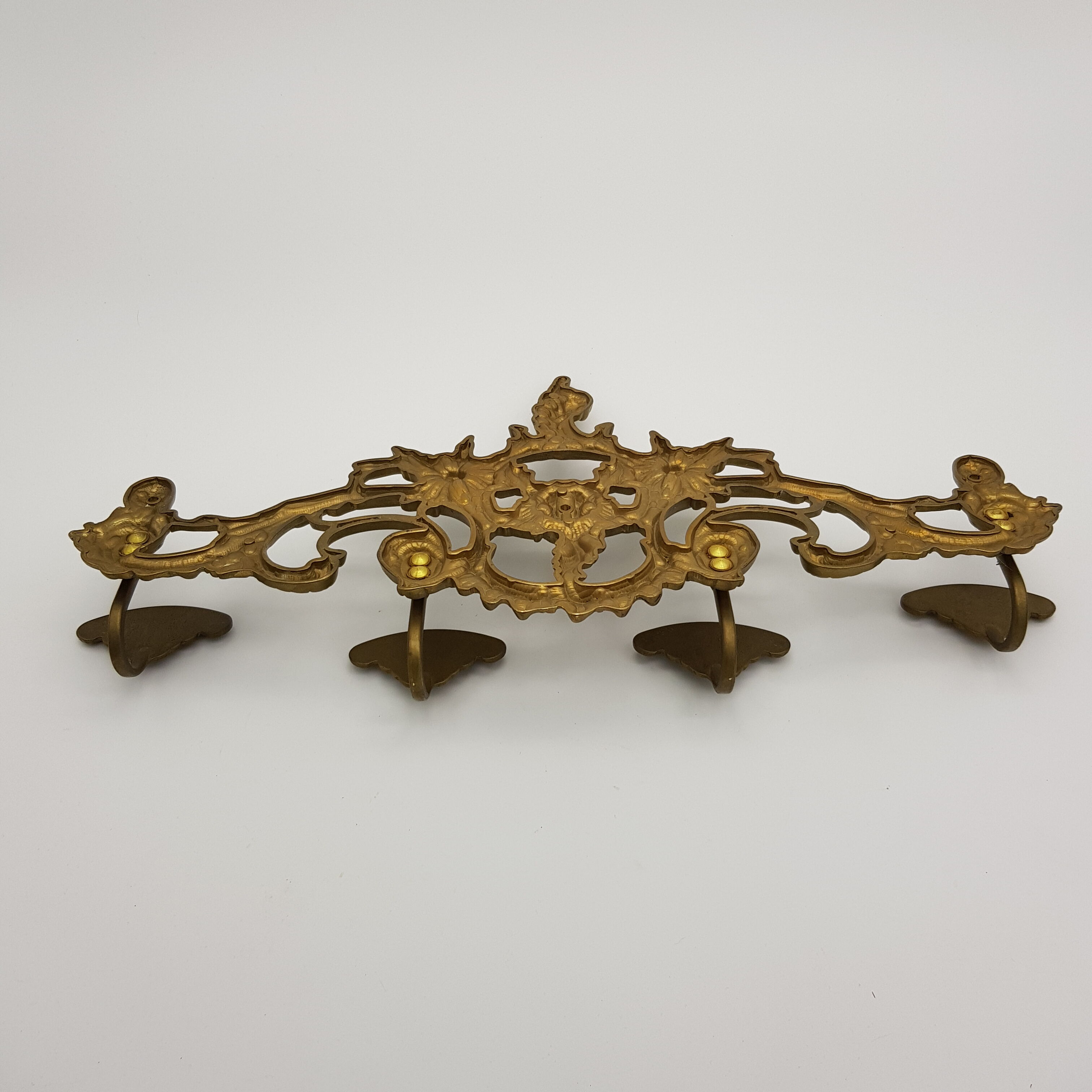 Brass rock-style coat door with 4 patères