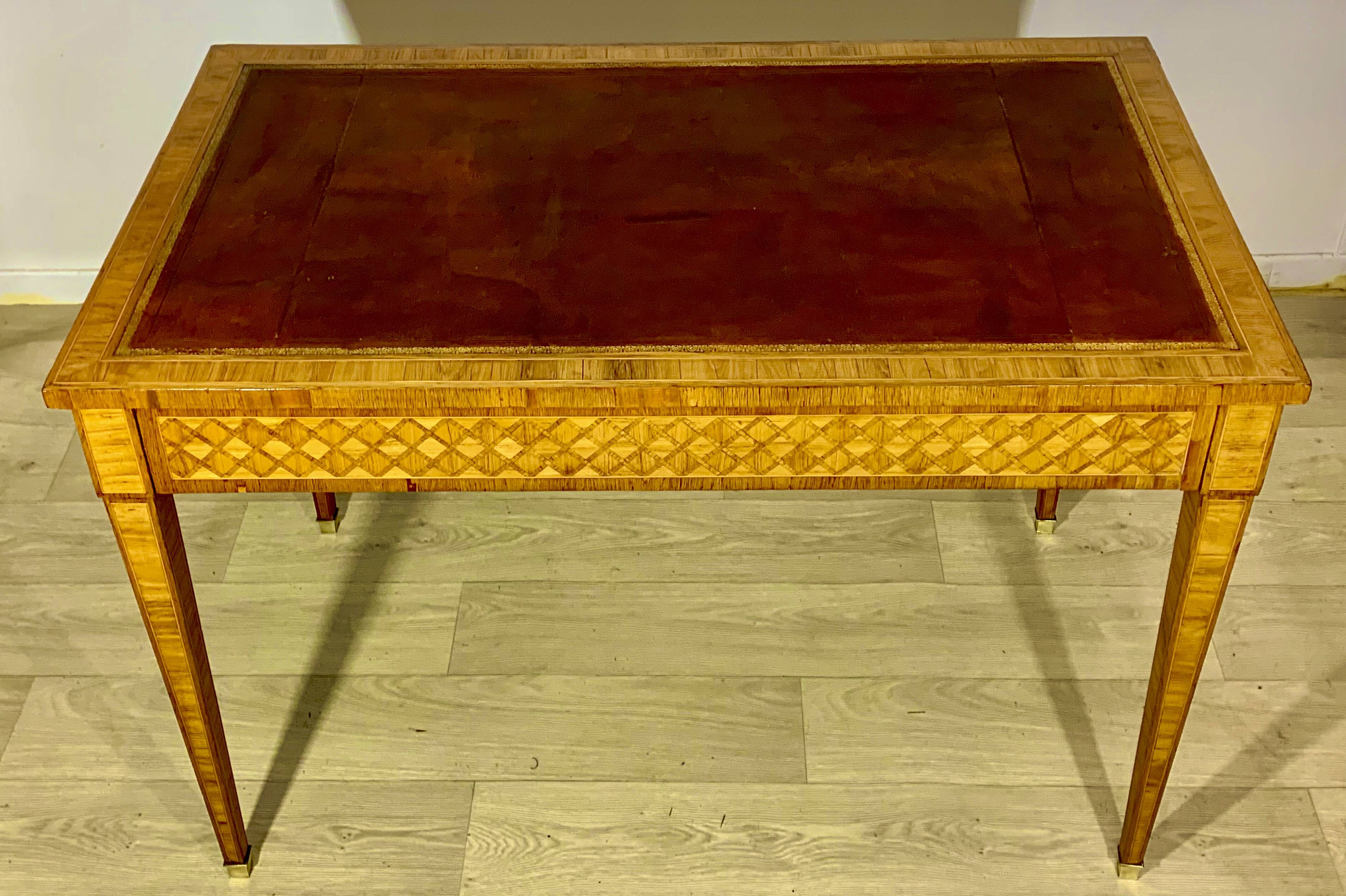 Louis XVI style desk in precious wood marquetry and gilded bronzes