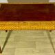 Louis XVI style desk in precious wood marquetry and gilded bronzes