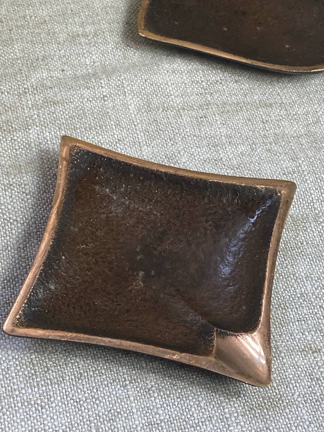 Bronze spade and diamond ashtrays