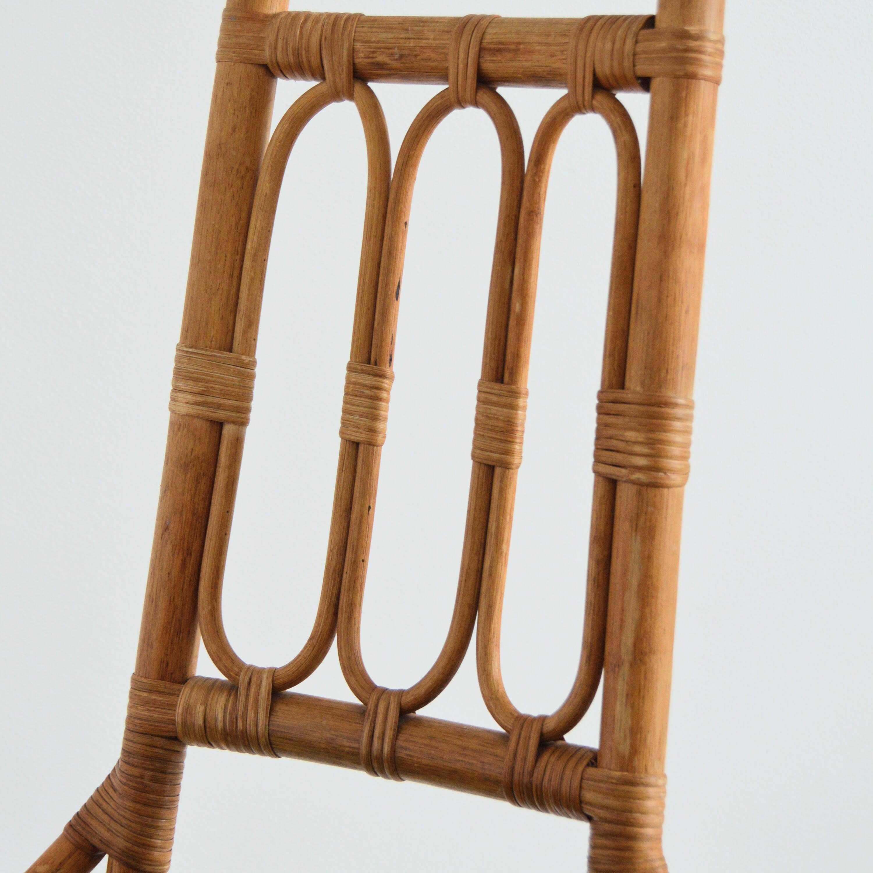 Pair of Italian high chairs in bamboo and rattan from the 1960s.