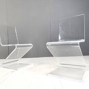 Pair of lucite zigzag dining chairs, 1980s