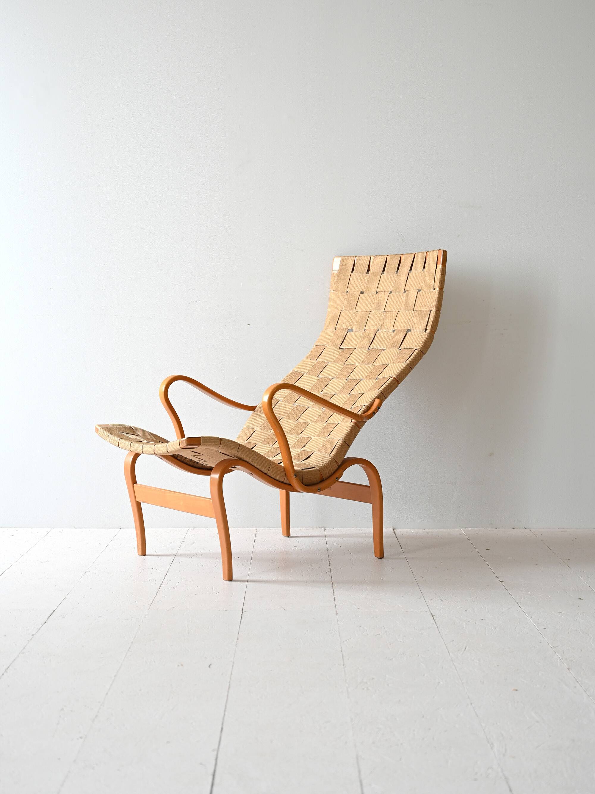 “Pernilla” armchair and footstool designed by Bruno Mathsson
