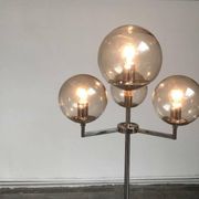 Chrome and glass floor lamp in mid-century German space style by Hustadt Leuchten, 1960s.