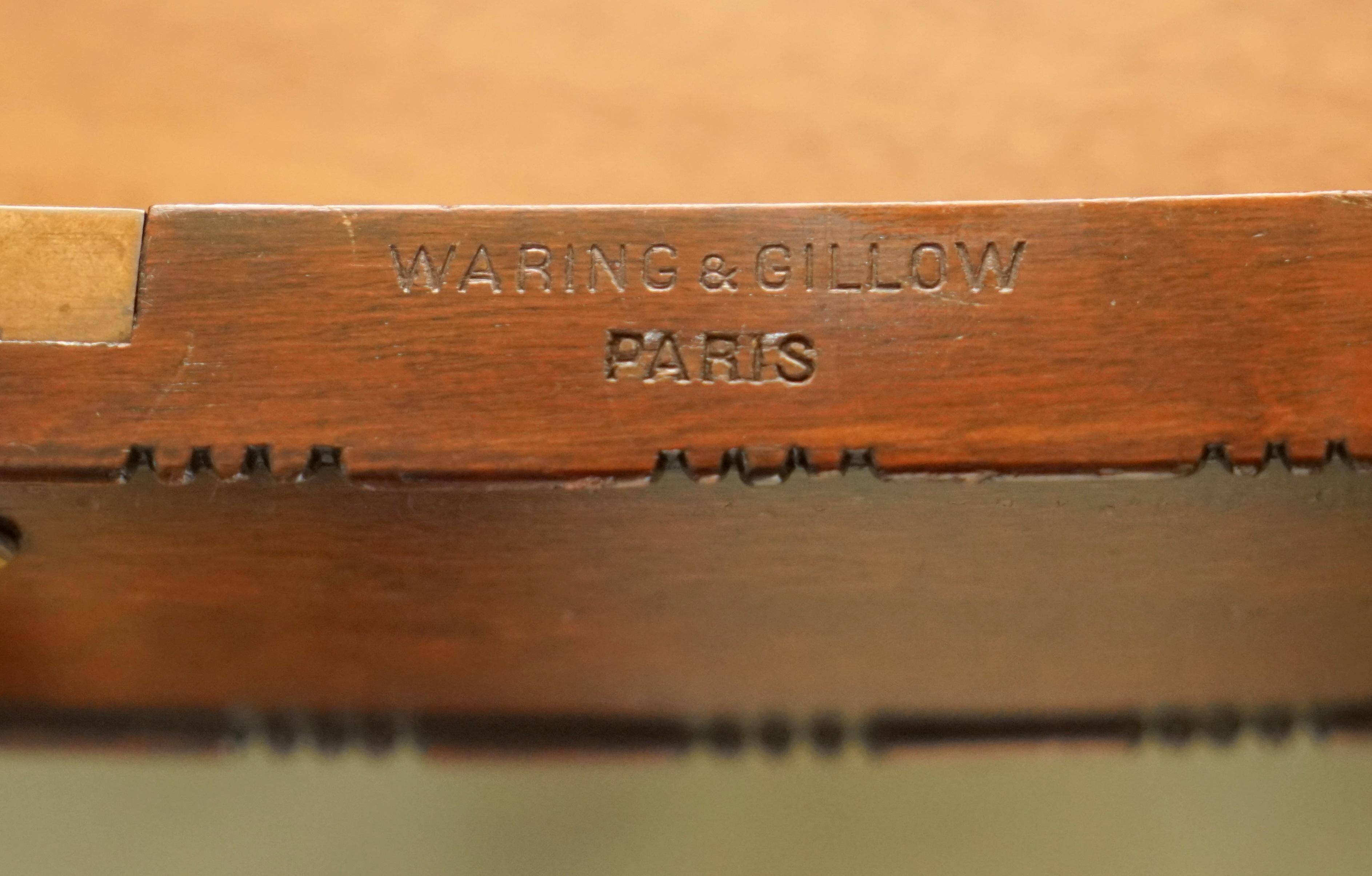 WARING & GILLOW library desk in the style of Thomas Chippendale with a leather top.