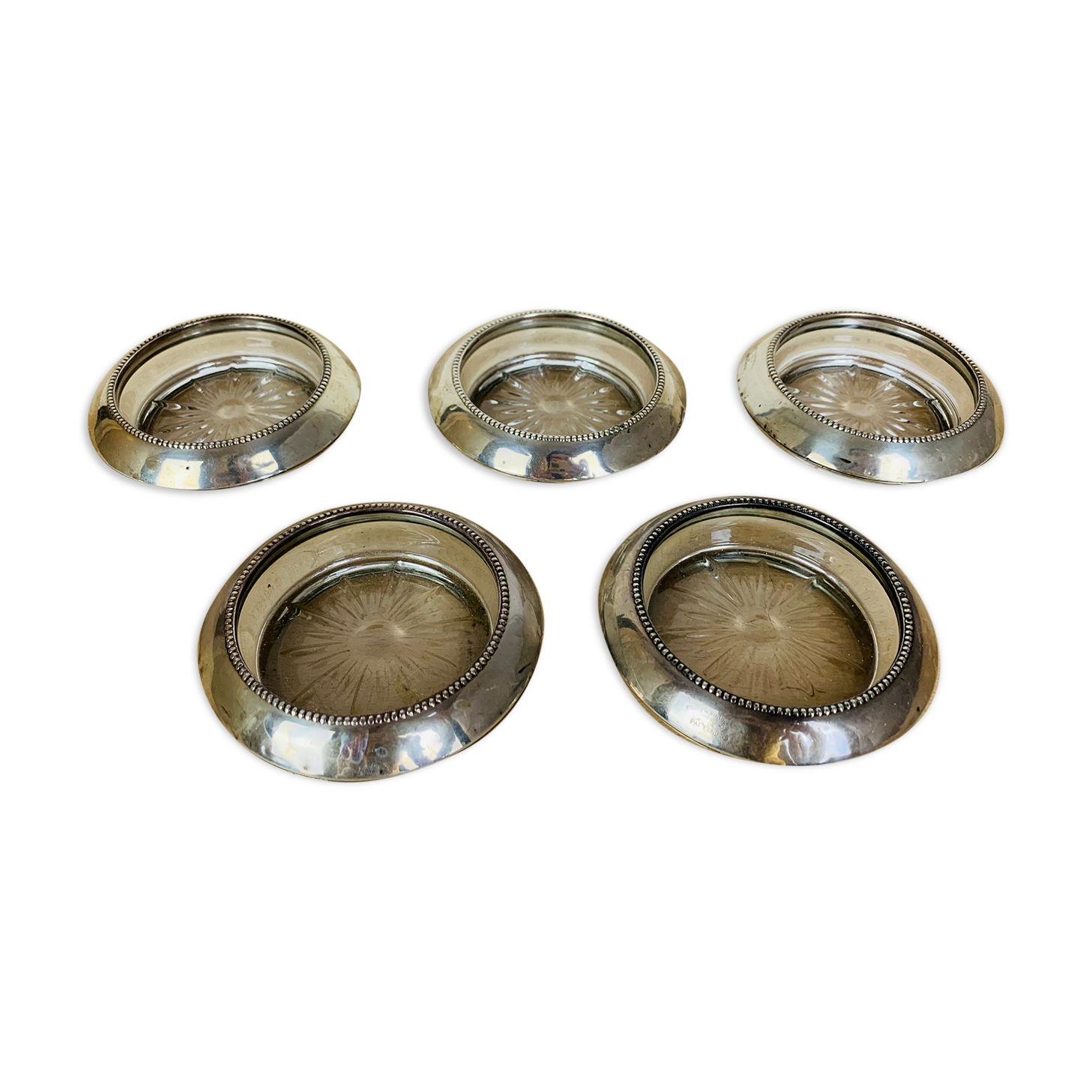 5 silver metal coasters Frank Whiting & Co