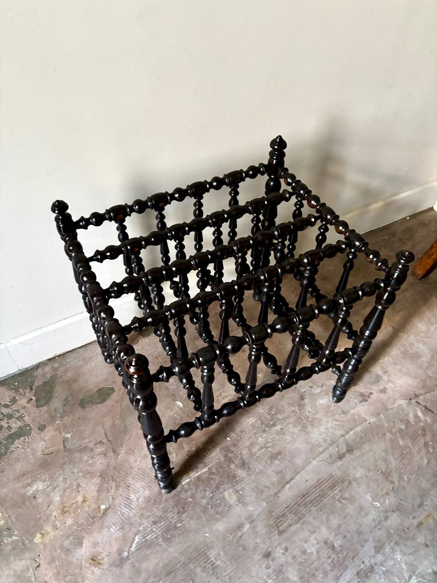 Napoleon III magazine rack in black turned wood
