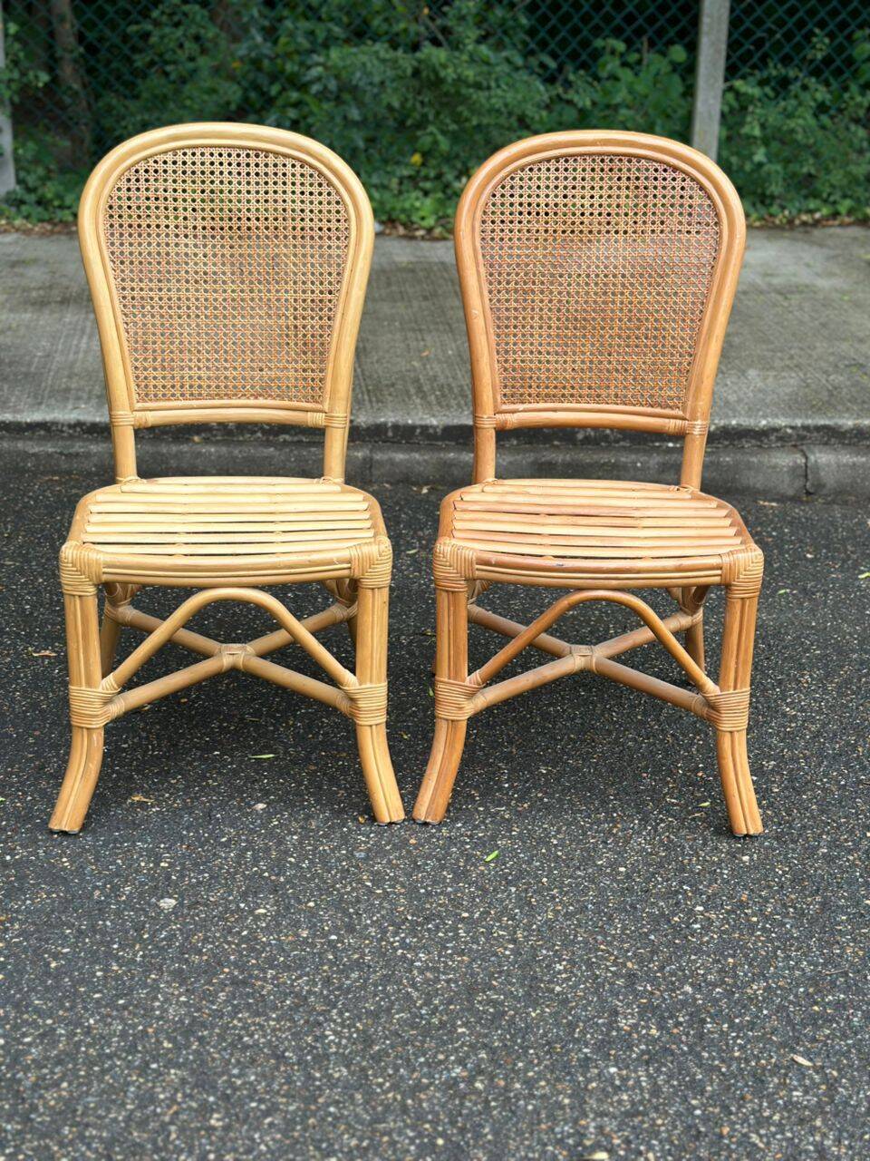 2 rattan and caned chairs in colonial bistro style from the 1990s.