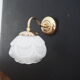 Brass wall lamp and white glass globe from the 1950s-1960s.