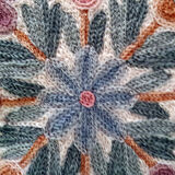 Set of three old hand-embroidered wool cushions