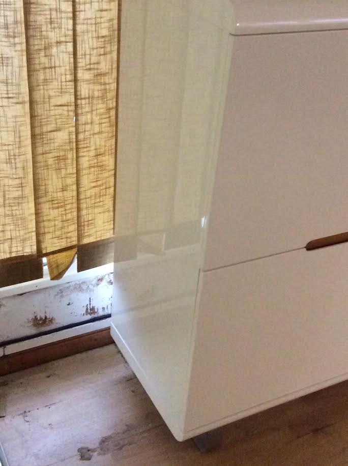 High furniture in white lacquered wood