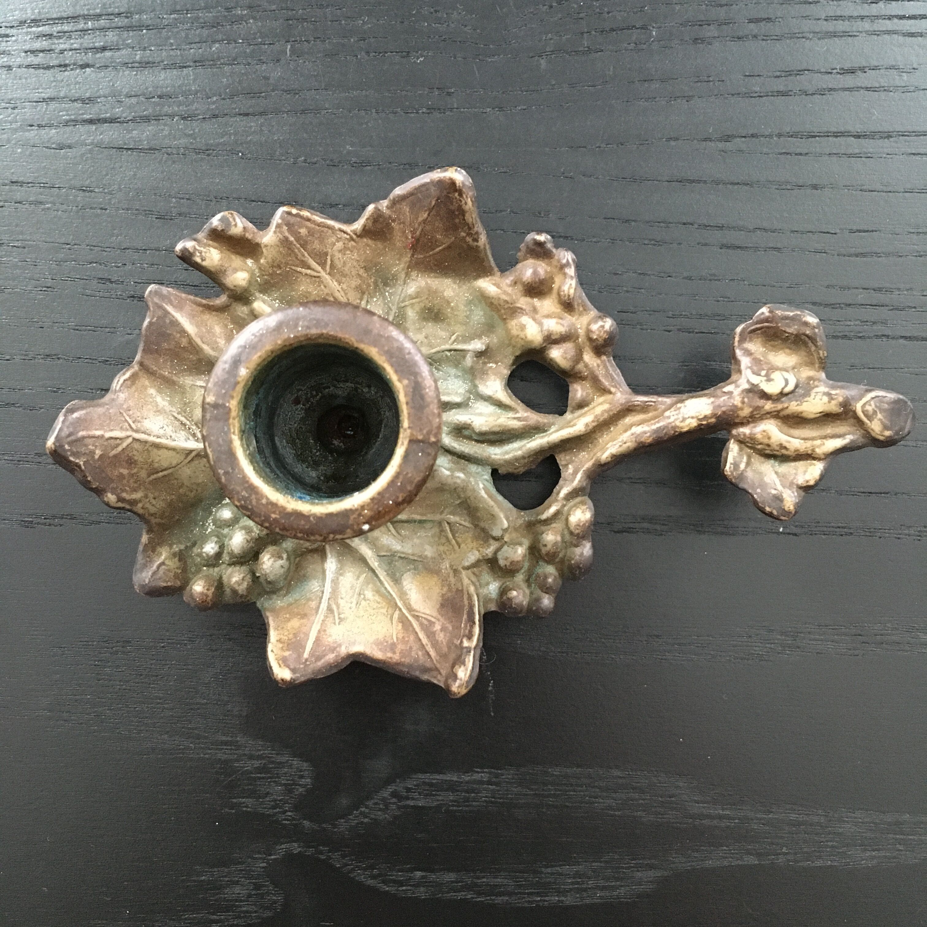 Bronze cellar rave candle holder