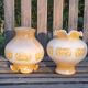 Duo of orange opaline tulip globes for suspension, art deco
