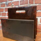 Brown plastic magazine holder with handle