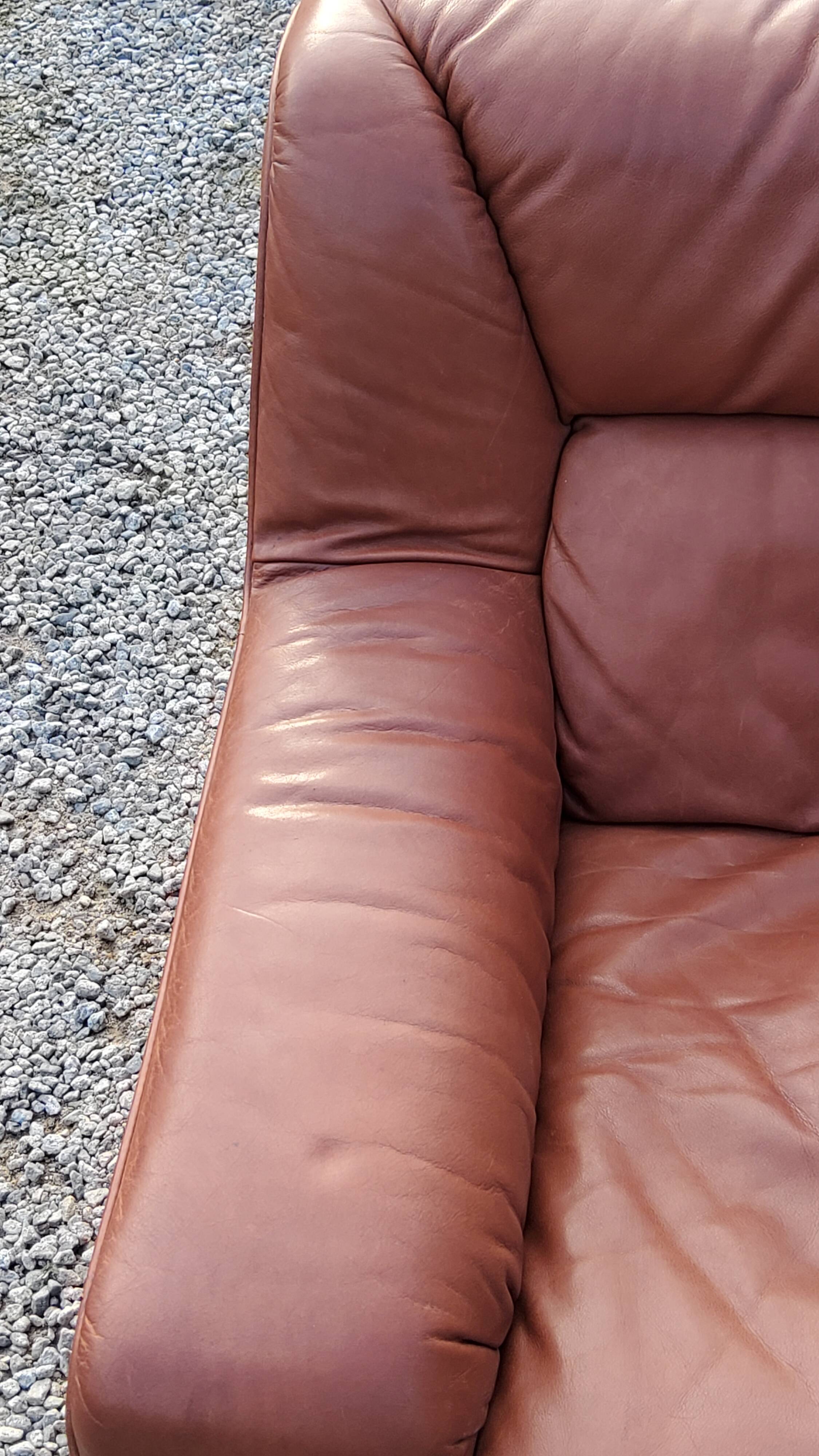 Pair of armchairs and De Sede sofa in cognac leather from the 70s/80s
