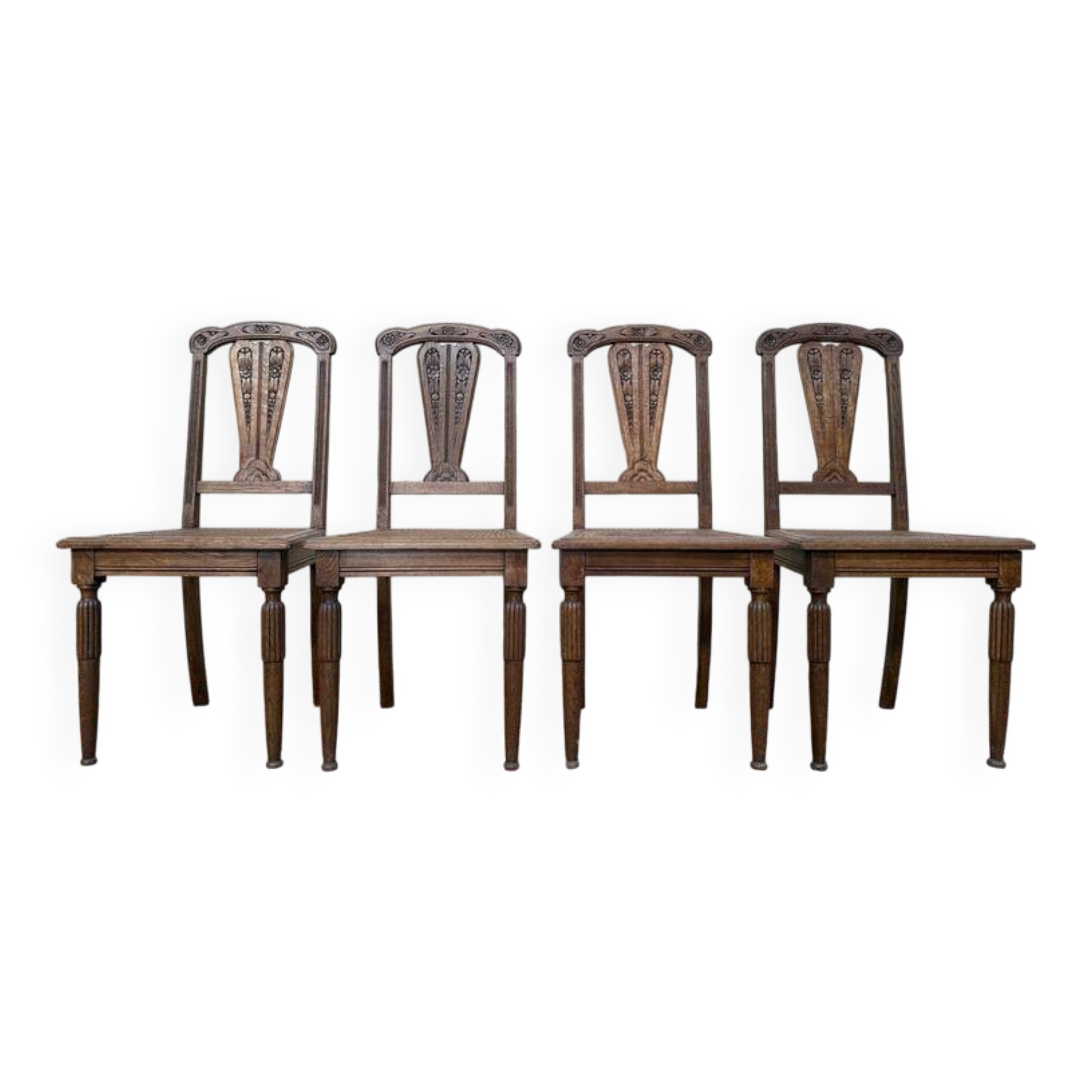 Suite de 4 chaises époque Art Déco en cannage